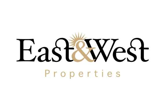 East and West Properties Logo